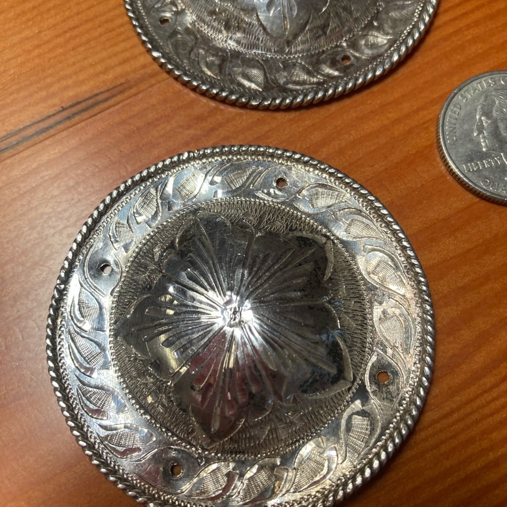 Pair of silver conchos